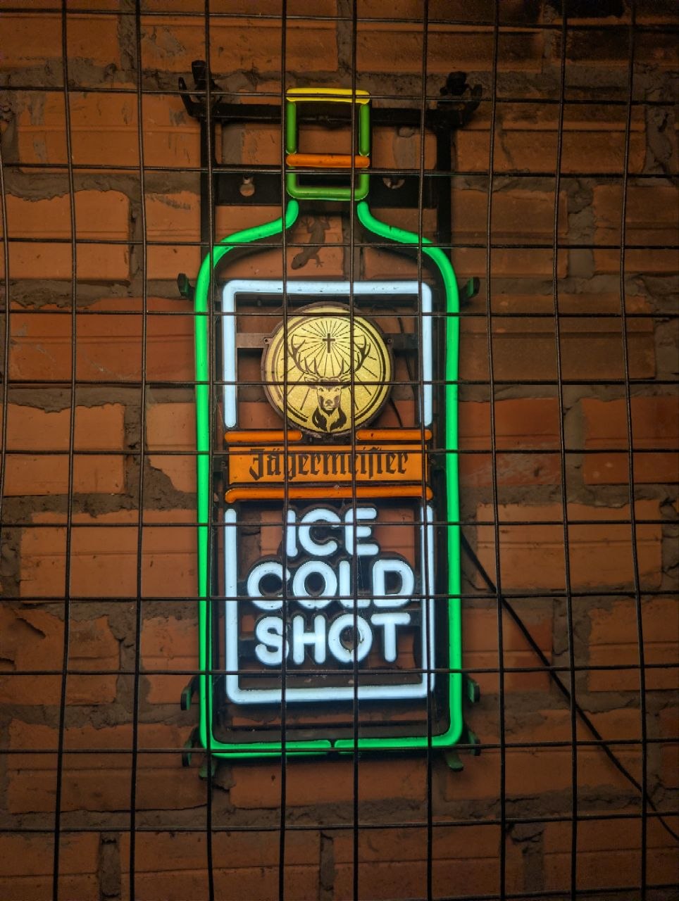 Neon sign outside Drunken Monkey Bar on Pub Street